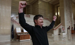 Plaintiff Dean Wilson reacts after hearing the Supreme Court's ruling on Insite, a drug addict inside a safe injection site, in Ottawa September 30, 2011. Wilson was Insite's first user.